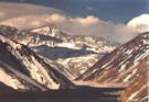 An image of winter scenery at the Yeso dam lake with 6000 m high mountains in the rear.