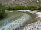 A view of a calm flowing river with clean water, Radal Siete Tasas National Park.