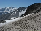 A view of snow-covered slopes near the Las Animas Pass, Mondaca Trail, Radal Siete Tazas, Chile.