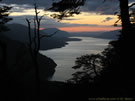 Image of sunset on the Riñihue lake.