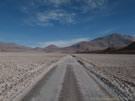 An image of a road running through the Ascotan Salt Lake.