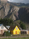 Yellows:Houses in Termas del Flaco, the place famous for dinosaur prints