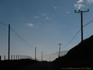 An image of poles and fences on the Pacific coast near Duao.