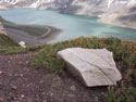 Gypsum Lake:  An image of Yeso Lake (Embalse Yeso) with a gypsum stone in the foreground.