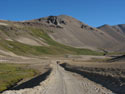 The Road From Nowhere to Nowhere.:  Image of a road going down from Pehuenche Pass to Chile, near Laguna Maule.