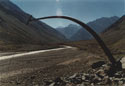 Forces of nature:  An image of a bent iron post near Portillo, Chile.