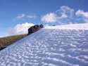 Meeting of the Elements:  A view of a mountain top covered with snow, Radal Siete Tasas, Chile.