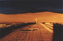 Moonscape:  An image of a road which goes from Panamericana Highway to Salar de Pajonales at sunset, similar to moonscape,  Chile. 