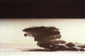 Iceberg:  An image of a small iceberg of strange form floating on a lake at El Morado National Park.