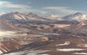 Cruising Altitude 5150 Meters:  A view of the mountains Ojos de Salado and Cerro Tres Cruces, taken from an altitude of about 5000 m, close to Salar de Pedernales, Chile.